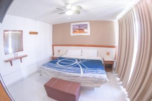 Postel nebo postele na pokoji v ubytování Hotel Niza Zona Piel