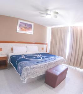 Postel nebo postele na pokoji v ubytování Hotel Niza Zona Piel