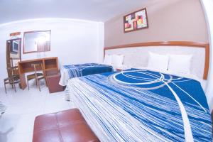 TV a/nebo společenská místnost v ubytování Hotel Niza Zona Piel