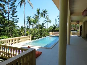 Výhľad na bazén v ubytovaní Gajah Mina Beach Resort alebo v jeho blízkosti