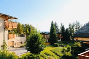 an aerial view of a house with a yard at Chalet Joli-Chalet in Crans-Montana