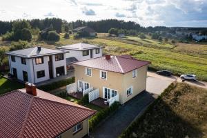 Galería fotográfica de 2 House Between Two Lakes en Vilna