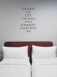 Cama ou camas em um quarto em Sambina Prime