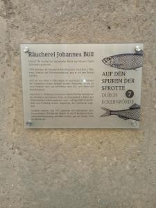 a sign on the side of a wall at Johannes Büll in Eckernförde