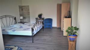 Ένα ή περισσότερα κρεβάτια σε δωμάτιο στο Apartmány Anna