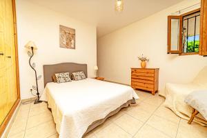 a bedroom with two beds and a window at Listed Accomodation 4 At 300m river 800m village and 30mn Nice Cannes Antibes in Le Bar-sur-Loup