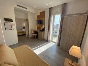 TV a/nebo společenská místnost v ubytování Hotel Caesar Paladium