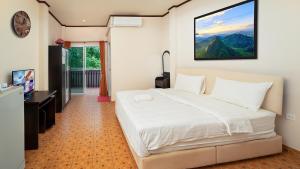 Кровать или кровати в номере Bantung Resort