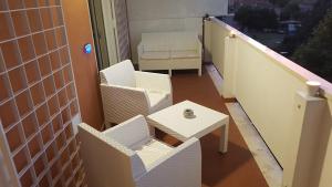 A seating area at Casa Stazione Magliana