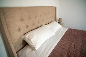 A bed or beds in a room at Hello Village Chania