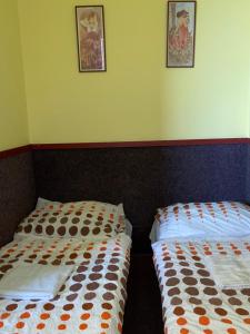 Postel nebo postele na pokoji v ubytování Restaurant Motel Hana Barbara Gastro sro