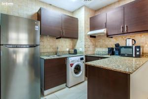 Kuchyň nebo kuchyňský kout v ubytování bnbmehomes - La Fontana