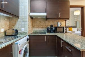 Kuchyň nebo kuchyňský kout v ubytování bnbmehomes - La Fontana