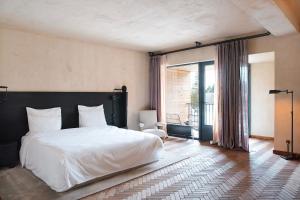Voodi või voodid majutusasutuse Rooms Hotel Kokhta toas