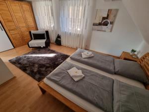 Postel nebo postele na pokoji v ubytování Stadthaus Nr. 16