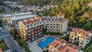 an aerial view of a resort with a pool at Grand Hotel Faros in Marmaris