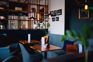 a restaurant with two tables and two chairs at Restauracja Balton in Grajewo