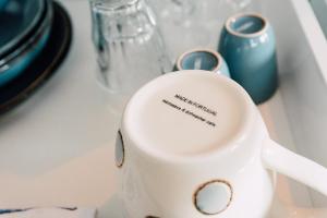 a white electric tea kettle sitting on a counter at Ubi-iter? History, heritage and hospitality in Doesburg