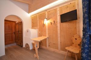 TV a/nebo společenská místnost v ubytování Agritur Agua Biencia