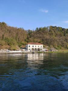 a house on the shore of a body of water at Panperduto in Somma Lombardo