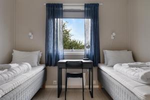 Ένα ή περισσότερα κρεβάτια σε δωμάτιο στο Master Apartment Hotels