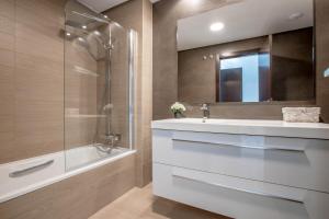 a bathroom with a sink and a shower at Apartment front Line La Cala Golf Resort in La Cala de Mijas +18 photos
