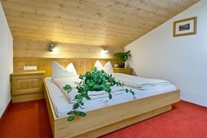 Postel nebo postele na pokoji v ubytování Haus Moostal