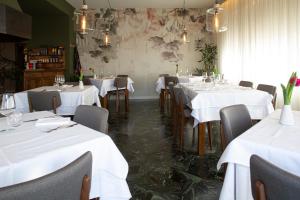 A restaurant or other place to eat at Albergo Ristorante Belvedere