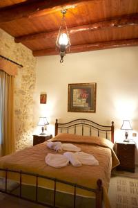 A bed or beds in a room at Patriko Villa
