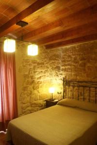 Postel nebo postele na pokoji v ubytování Casa Rural Ca Lazaro