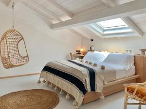 a bedroom with a large bed and a window at Santa Lucia Maccarese - Residenza Agricola in Maccarese