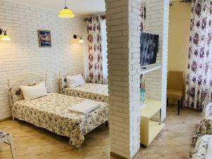 Postel nebo postele na pokoji v ubytování Green Hall Hotel