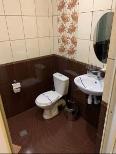 Koupelna v ubytování Готель Цісар