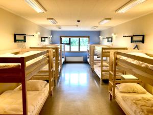 Paradise Cave Hostel & Guesthouse客房内的一张或多张床位