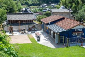 an aerial view of a house with a yard at GREAT VACATION in Ōhama +98 photos