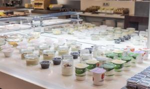 a table with many different types of food in jars at Ilunion Calas de Conil in Conil de la Frontera