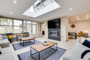 a living room with a couch and a fireplace at Castle View in Bamburgh