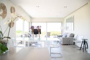 Et opholdsområde på Casa con vistas al mar con piscina