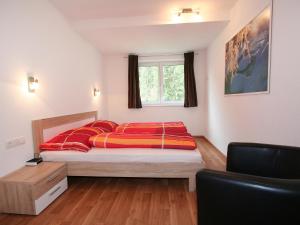 Postel nebo postele na pokoji v ubytování Apartment Collina by Interhome