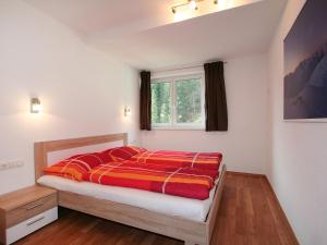 Postel nebo postele na pokoji v ubytování Apartment Collina by Interhome