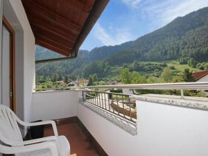 a balcony with a view of a mountain at Apartment Handle-3 by Interhome in Ried im Oberinntal
