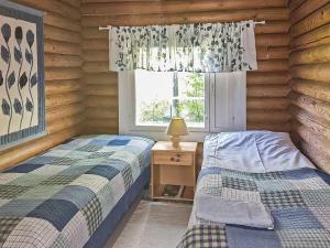 Postel nebo postele na pokoji v ubytování Holiday Home Savenaho by Interhome + 4 fotografie
