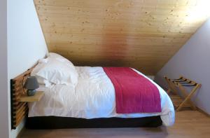 Кровать или кровати в номере L'Ôberge