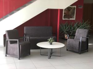 Posezení v ubytování Hotel Villa de los Arcos