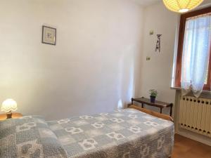 Łóżko lub łóżka w pokoju w obiekcie Apartment Sonia by Interhome