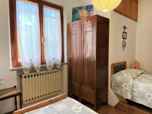 Łóżko lub łóżka w pokoju w obiekcie Apartment Sonia by Interhome