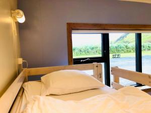 Paradise Cave Hostel & Guesthouse客房内的一张或多张床位
