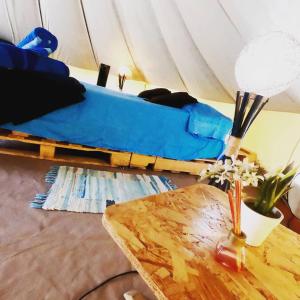 Un pat sau paturi într-o cameră la Glamping Due Amici