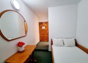 Postel nebo postele na pokoji v ubytování Motel Thessaloniki