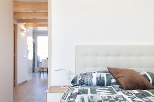 Postel nebo postele na pokoji v ubytování Hauzify I Apartament 4Winds